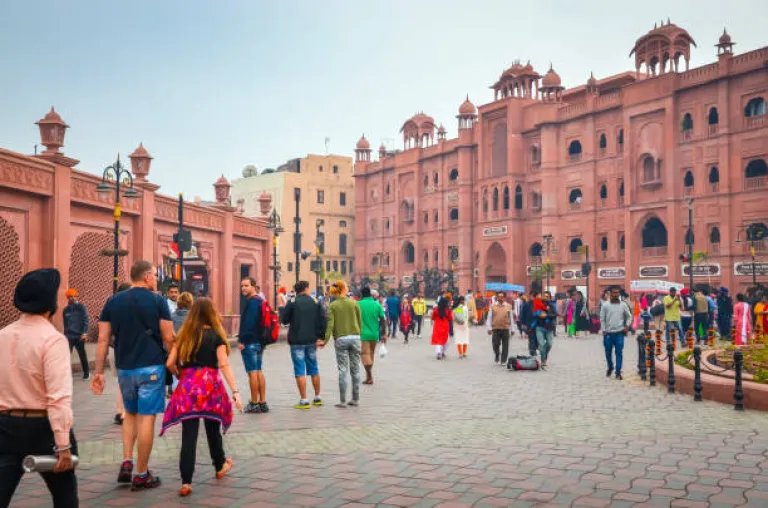 People are walking along the street in Amritsar, Punjab