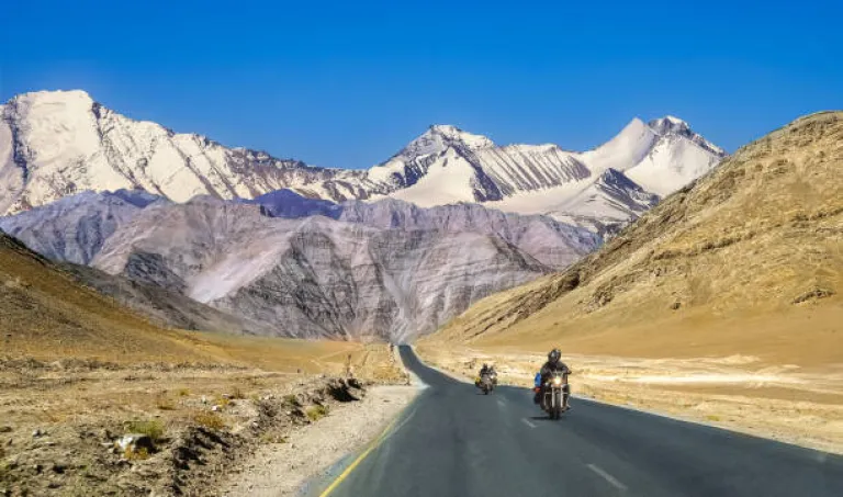 Indian bikers travel on national highway with scenic landscape at Ladakh India