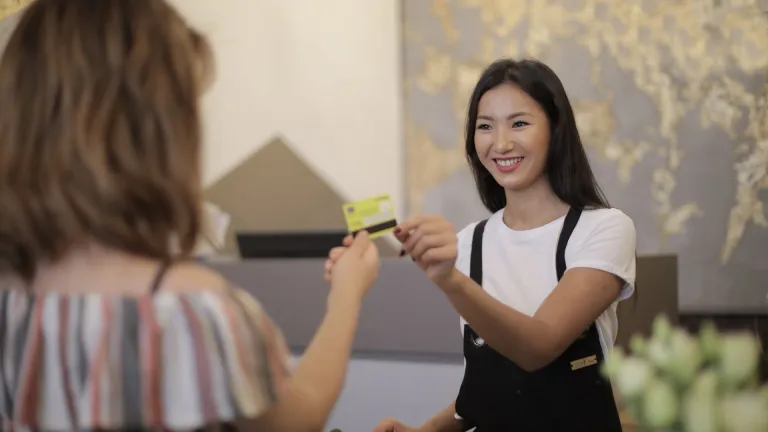 Woman paying through card