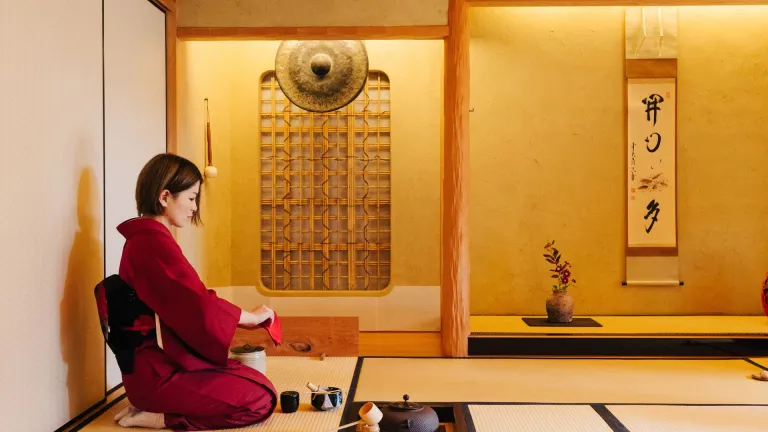 Woman performing tea ceremony