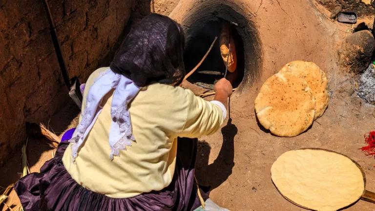 Woman making Khubz