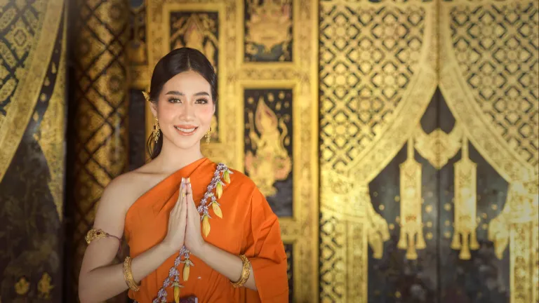 Thai woman offering Wai greeting