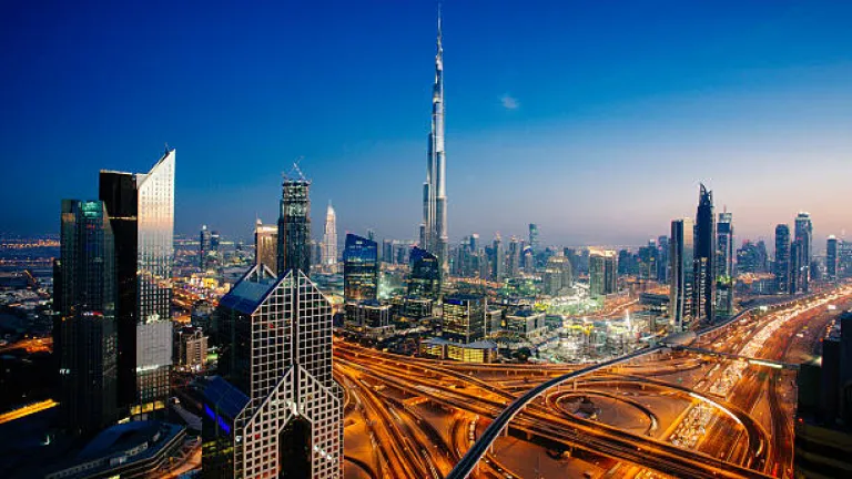 Dubai sky line with traffic junction and Burj Khalifa