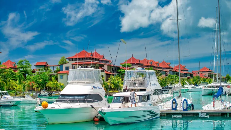 Boats anchored in Eden Island&#039;s harbor