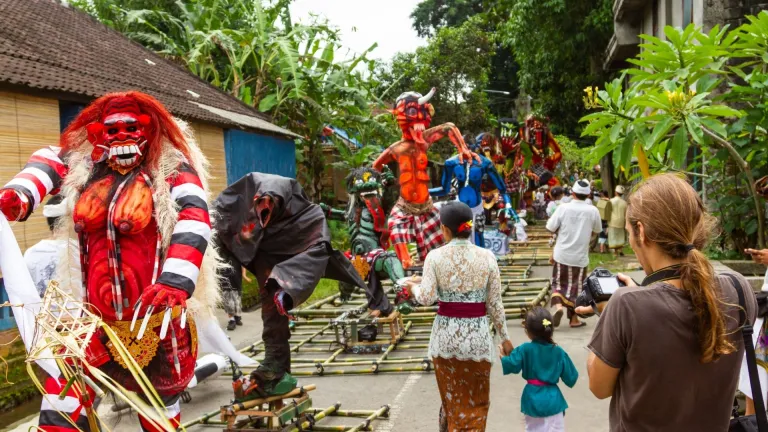 Tourists enjoying the Ogoh Ogoh Parade