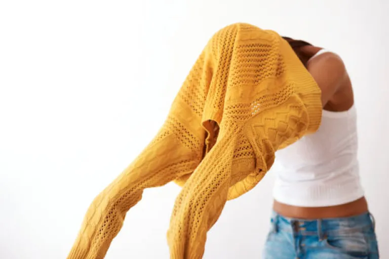 Wear your chunky sweater rather carrying it in your bag