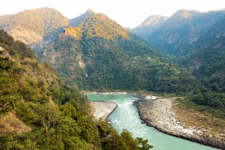 The Ganges flowing through the Himalayan foothills near Rishikesh.