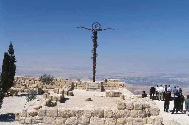 Contemplating the panoramic views from Mount Nebo.