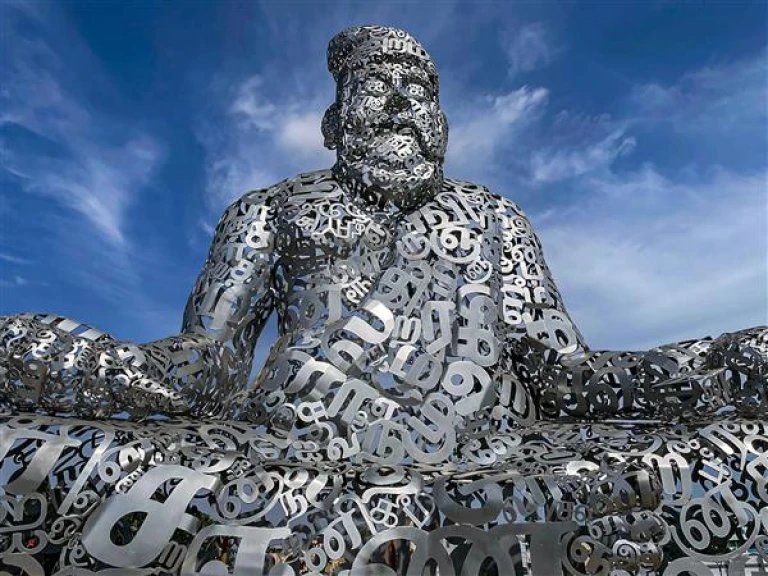 Thiruvalluvar&#039;s steel statue in Coimbatore, formed by Tamil letters, celebrates language and culture.