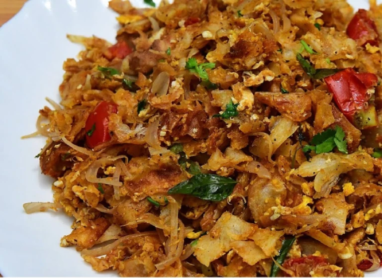 Kothu Parotta: Spicy shredded flatbread, a South Indian favorite!