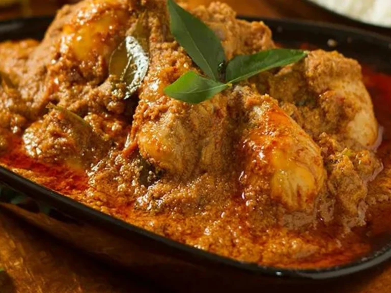 Chicken Chettinad: Spicy South Indian chicken curry with aromatic spices.
