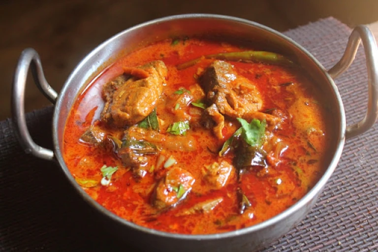Fish Curry: Tangy and aromatic dish.