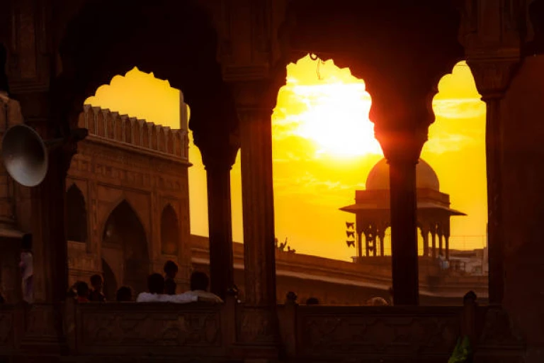 Intensive beautiful sunset seem at the arcades of the red Fort in New Delhi