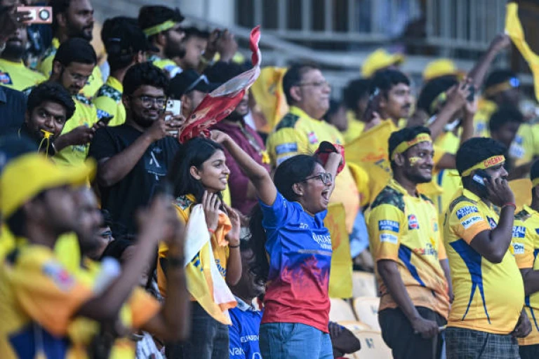 Fans cheer before the start of the Indian Premier League (IPL) Twenty20 cricket