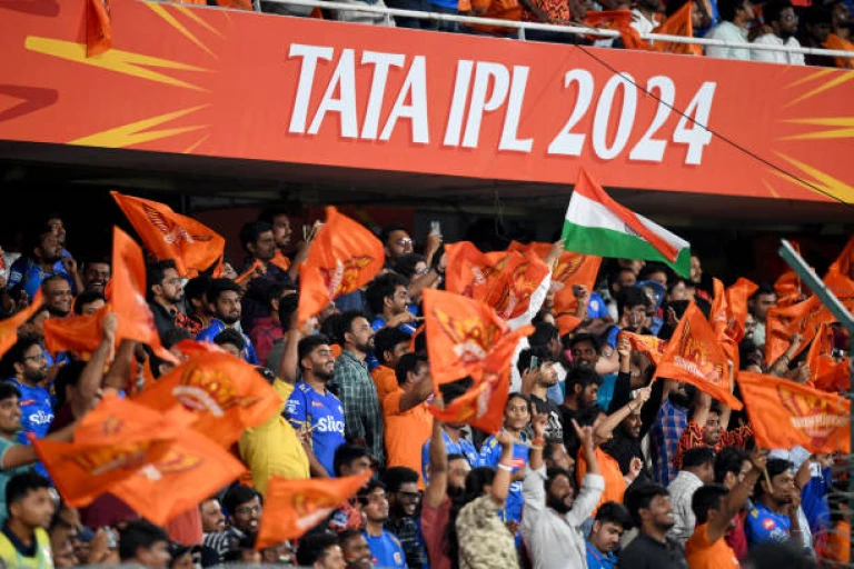 Fans cheer during the Indian Premier League (IPL) Twenty20 cricket match between Sunrisers Hyderabad and Mumbai Indians at the Rajiv Gandhi International Stadium in Hyderabad