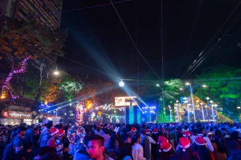 Decorated lights and Christmas celebration at illuminated Park street and Camac Street junction