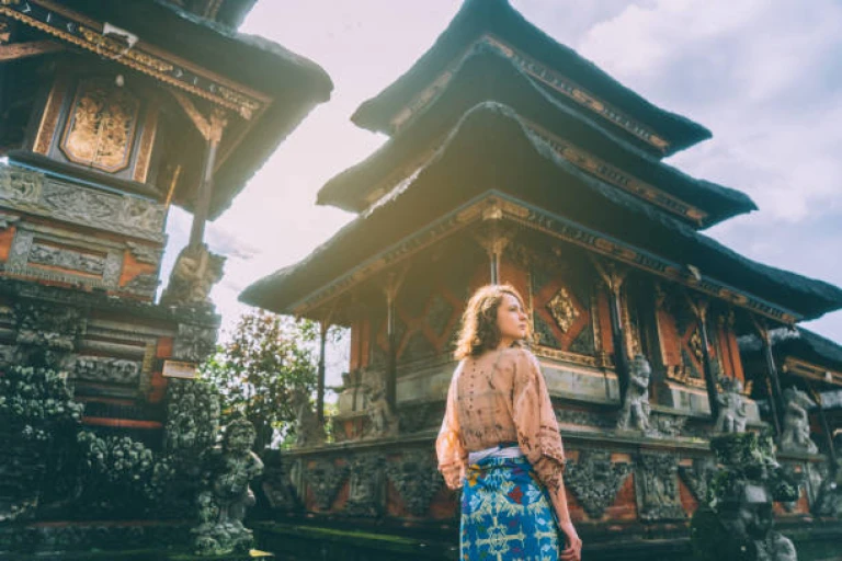 Woman walking in Balinese temple