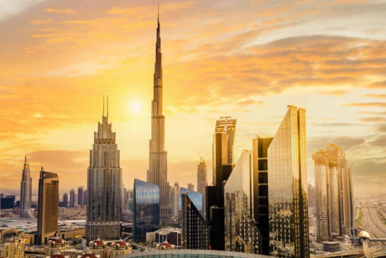 View of Dubai downtown Skyline at sunset.